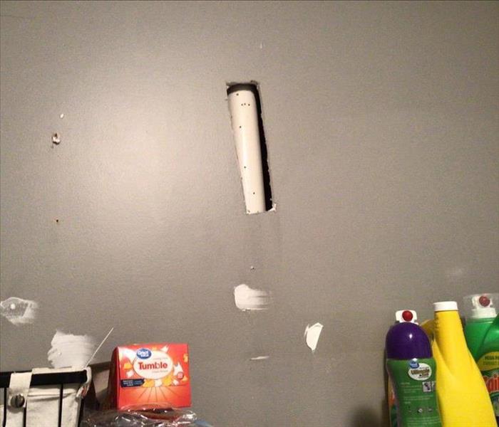Plumbing drain tube with drill holes in it